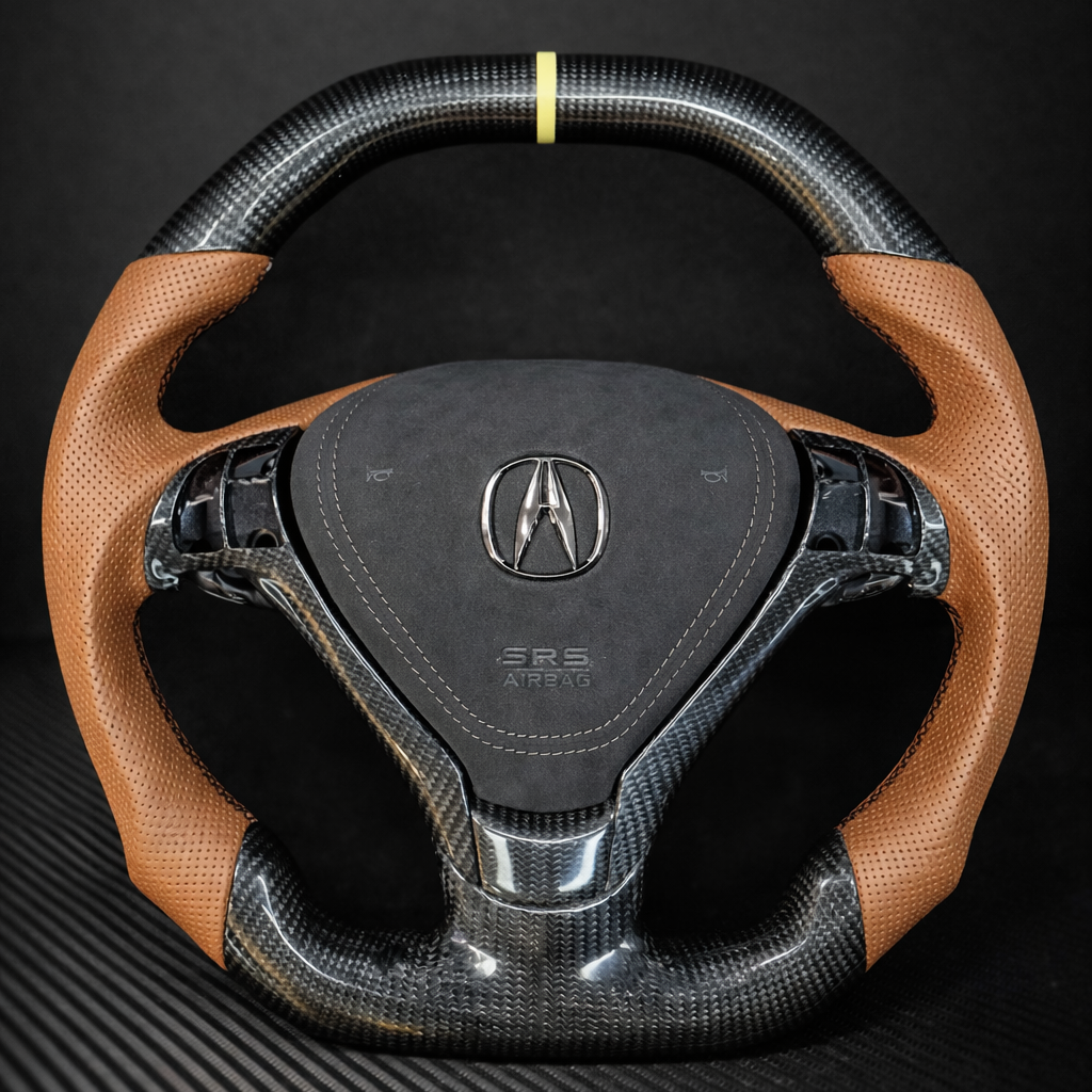 Carbon fiber steering wheel with brown leather accents on a black background