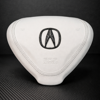 White car headrest with Acura logo on a black background